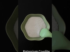 Cryolite de potassium en particules