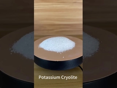 Cryolite de potassium en particules